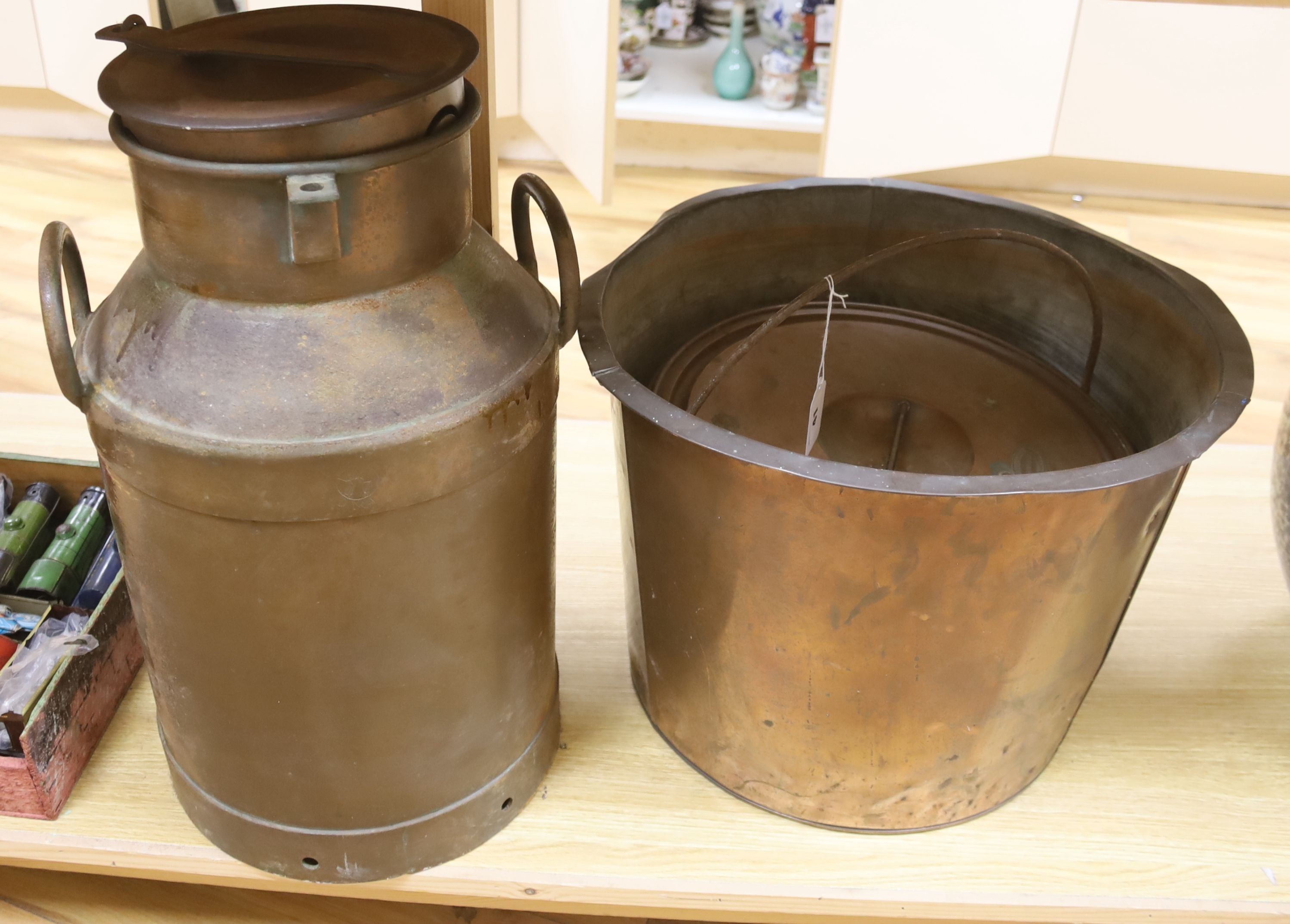 A copper pan and a milk churn, height 53cm